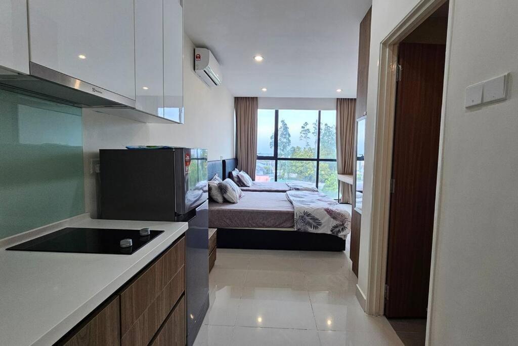 Kenyalang Kozi Square Apartment